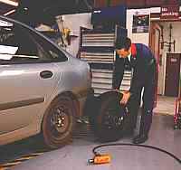 Wheel change at PJN Motor Engineering Ltd